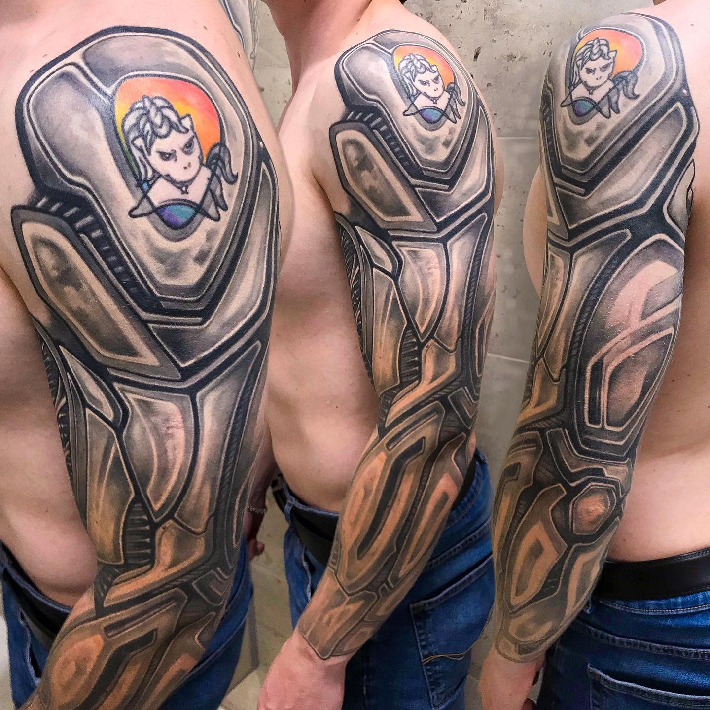Cyberpunk-inspired full-arm tattoo featuring biomechanical armor with a colorful cartoon figure on the shoulder